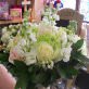 Brides hand tied Summer bouquet with scented stock, hydrangea and roses